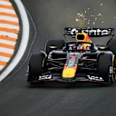 ZANDVOORT, NETHERLANDS - AUGUST 29: Sparks fly behind Max Verstappen of the Netherlands driving the (1) Oracle Red Bull Racing RB21 on track during practice ahead of the F1 Grand Prix of Netherlands at Circuit Zandvoort on August 29, 2025 in Zandvoort, Netherlands. (Photo by James Sutton/Getty Images)