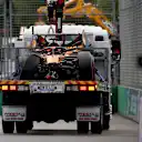 MELBOURNE, AUSTRALIA - MARCH 08: The crashed car of Oscar Piastri of Australia driving the (81) McLaren MCL40 Mercedes is cleared by the marshals during the F1 Grand Prix of Australia at Albert Park Grand Prix Circuit on March 08, 2026 in Melbourne, Australia. (Photo by Dom Gibbons - Formula 1/Formula 1 via Getty Images)