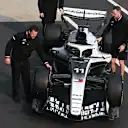 SHANGHAI, CHINA - MARCH 12: Mechanics with the car of Sergio Perez of Mexico and Cadillac F1 Team during previews ahead of the F1 Grand Prix of China at Shanghai International Circuit on March 12, 2026 in Shanghai, China. (Photo by Mark Sutton - Formula 1/Formula 1 via Getty Images)