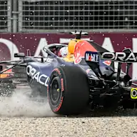 Red Bull Racing's Dutch driver Max Verstappen crashes during the qualifying session of the Formula
