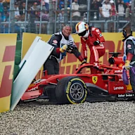 HOCKENHEIM, GERMANY - JULY 22: Sebastian Vettel of Germany and Ferrari climbs from the car after