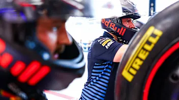 SINGAPORE, SINGAPORE - SEPTEMBER 20: The Oracle Red Bull Racing team work on tyres in the garage