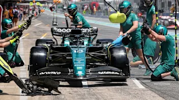 Aston Martin's Canadian driver Lance Stroll makes a pit-stop during the first free practice session