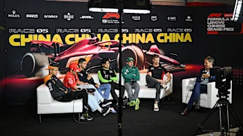 (L-R) McLaren's British driver Lando Norris, Ferrari's Monegasque driver Charles Leclerc, Alpine's