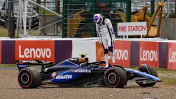 SUZUKA, JAPAN - APRIL 05: Logan Sargeant of United States and Williams climbs from his car after
