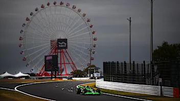 SUZUKA, JAPAN - APRIL 05: Sparks fly behind Valtteri Bottas of Finland driving the (77) Kick Sauber