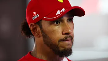 BAHRAIN, BAHRAIN - APRIL 13: Lewis Hamilton of Great Britain driving the (44) Scuderia Ferrari