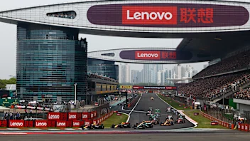 SHANGHAI, CHINA - APRIL 21: Max Verstappen, Red Bull Racing RB20, leads Sergio Perez, Red Bull