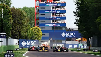 IMOLA, ITALY - MAY 19: Fans show their support as drivers make their way to parc ferme following