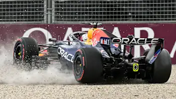 Red Bull Racing's Dutch driver Max Verstappen crashes during the qualifying session of the Formula