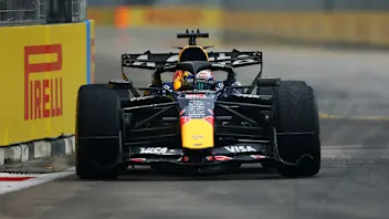 SINGAPORE, SINGAPORE - OCTOBER 10: Max Verstappen of the Netherlands driving the (3) Oracle Red