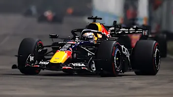 SINGAPORE, SINGAPORE - OCTOBER 11: Max Verstappen of the Netherlands driving the (3) Oracle Red