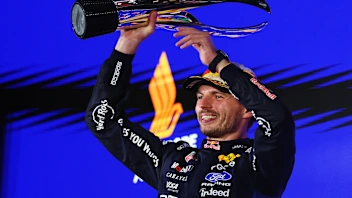 SINGAPORE, SINGAPORE - OCTOBER 11: Race winner Max Verstappen of the Netherlands and Oracle Red