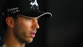 SUZUKA, JAPAN - SEPTEMBER 21: Pierre Gasly of France and Alpine F1 talks to the media in the