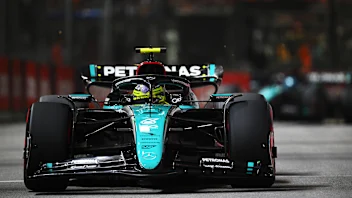 SINGAPORE, SINGAPORE - SEPTEMBER 22: Lewis Hamilton of Great Britain driving the (44) Mercedes AMG