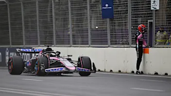 BAKU, AZERBAIJAN - SEPTEMBER 14: Esteban Ocon of France and Alpine F1 talks with track marshals