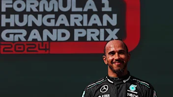 BUDAPEST, HUNGARY - JULY 21: Third placed Lewis Hamilton of Great Britain and Mercedes celebrates