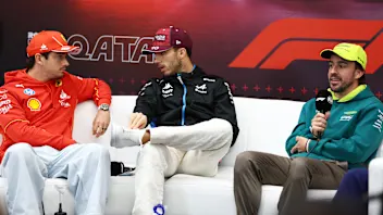 LUSAIL CITY, QATAR - NOVEMBER 28: Charles Leclerc of Monaco and Ferrari, Pierre Gasly of France and