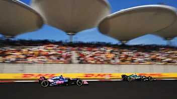 SHANGHAI, CHINA - MARCH 21: Fernando Alonso of Spain driving the (14) Aston Martin F1 Team AMR25