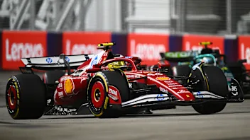 SINGAPORE, SINGAPORE - OCTOBER 05: Lewis Hamilton of Great Britain driving the (44) Scuderia