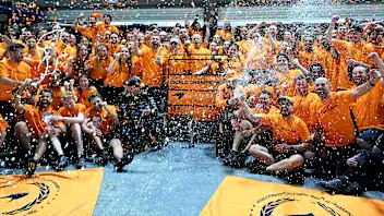 SINGAPORE, SINGAPORE - OCTOBER 05: Lando Norris of Great Britain and McLaren Oscar Piastri of