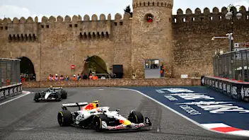 BAKU, AZERBAIJAN - SEPTEMBER 21: Liam Lawson of New Zealand driving the (30) Visa Cash App Racing