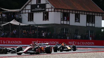 SPA, BELGIUM - JULY 27: Charles Leclerc of Monaco driving the (16) Scuderia Ferrari SF-25 leads Max