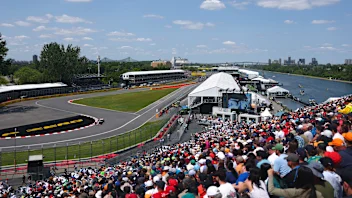 MONTREAL, QUEBEC - JUNE 13: Lewis Hamilton of Great Britain and Scuderia Ferrari and George Russell