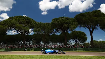 IMOLA, ITALY - MAY 16: Oliver Bearman of Great Britain driving the (87) Haas F1 VF-25 Ferrari leads