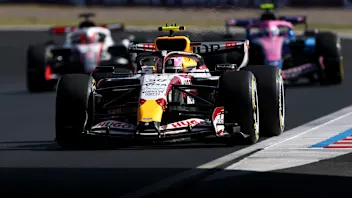 SUZUKA, JAPAN - MARCH 27: Liam Lawson of New Zealand driving the (30) Visa Cash App Racing Bulls