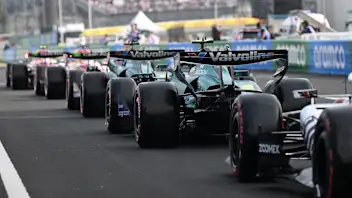 SUZUKA, JAPAN - MARCH 28: Fernando Alonso of Spain driving the (14) Aston Martin F1 Team AMR26