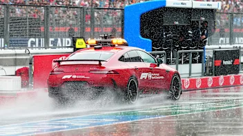KUALA LUMPUR, MALAYSIA - OCTOBER 04: The FIA Medical Car kicks up spray in the Pitlane prior to the