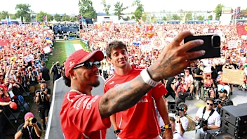 MONZA, ITALY - SEPTEMBER 05: Lewis Hamilton of Great Britain and Scuderia Ferrari and Charles