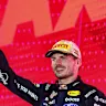 SINGAPORE, SINGAPORE - OCTOBER 11: Race winner Max Verstappen of the Netherlands and Oracle Red