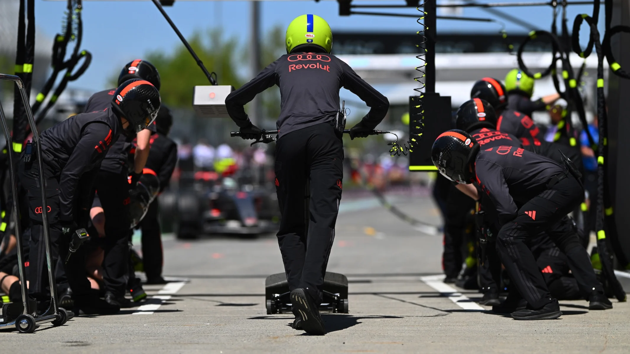 MONTREAL, QUEBEC - MAY 22: The Audi F1 Team pit crew ready for a stop during practice ahead of the