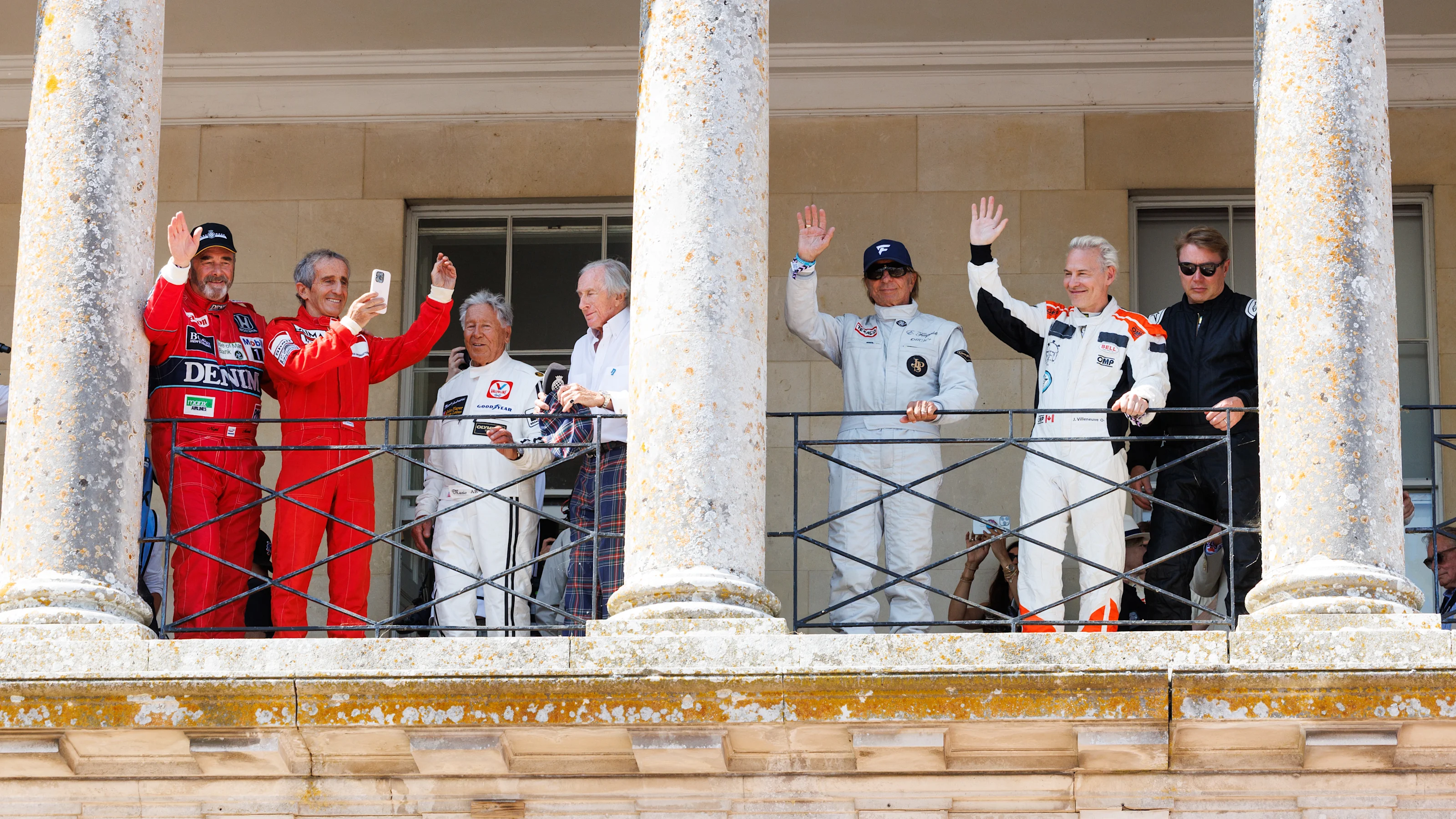 CHICHESTER, ENGLAND - JULY 12: F1 Champions Balcony Moment, Nigel Mansell, Alain Prost, Mario