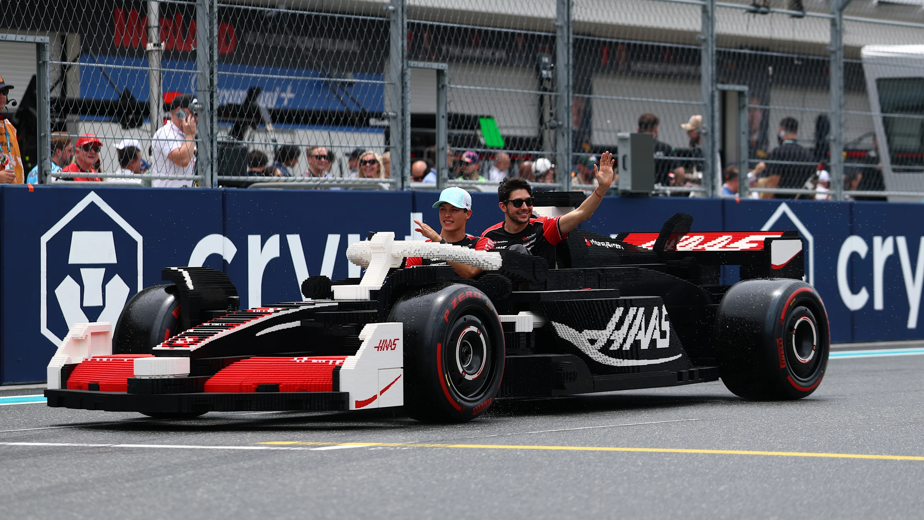 MIAMI, FLORIDA - MAY 04: Oliver Bearman of Great Britain and Haas F1 and Esteban Ocon of France and