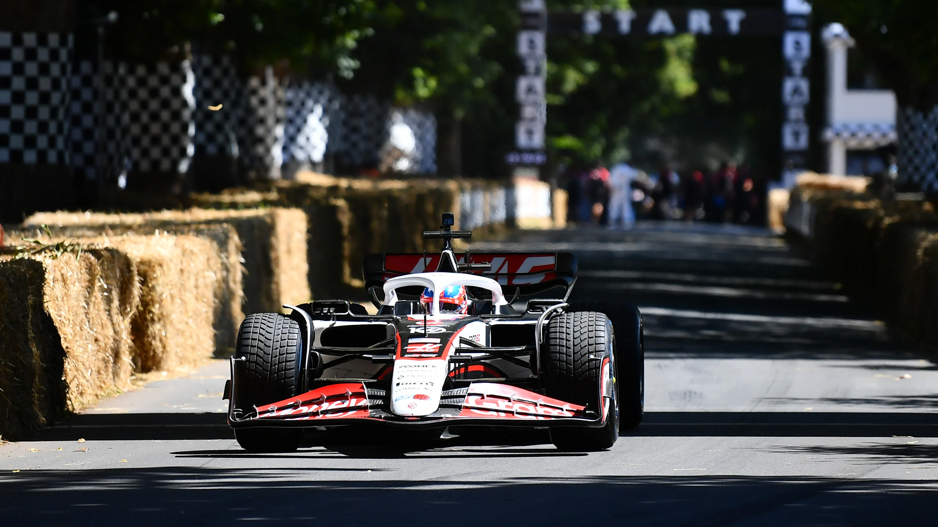 CHICHESTER, ENGLAND - JULY 11: Gene Haas, Founder and Chairman of Haas F1 driving the Haas F1 VF-23