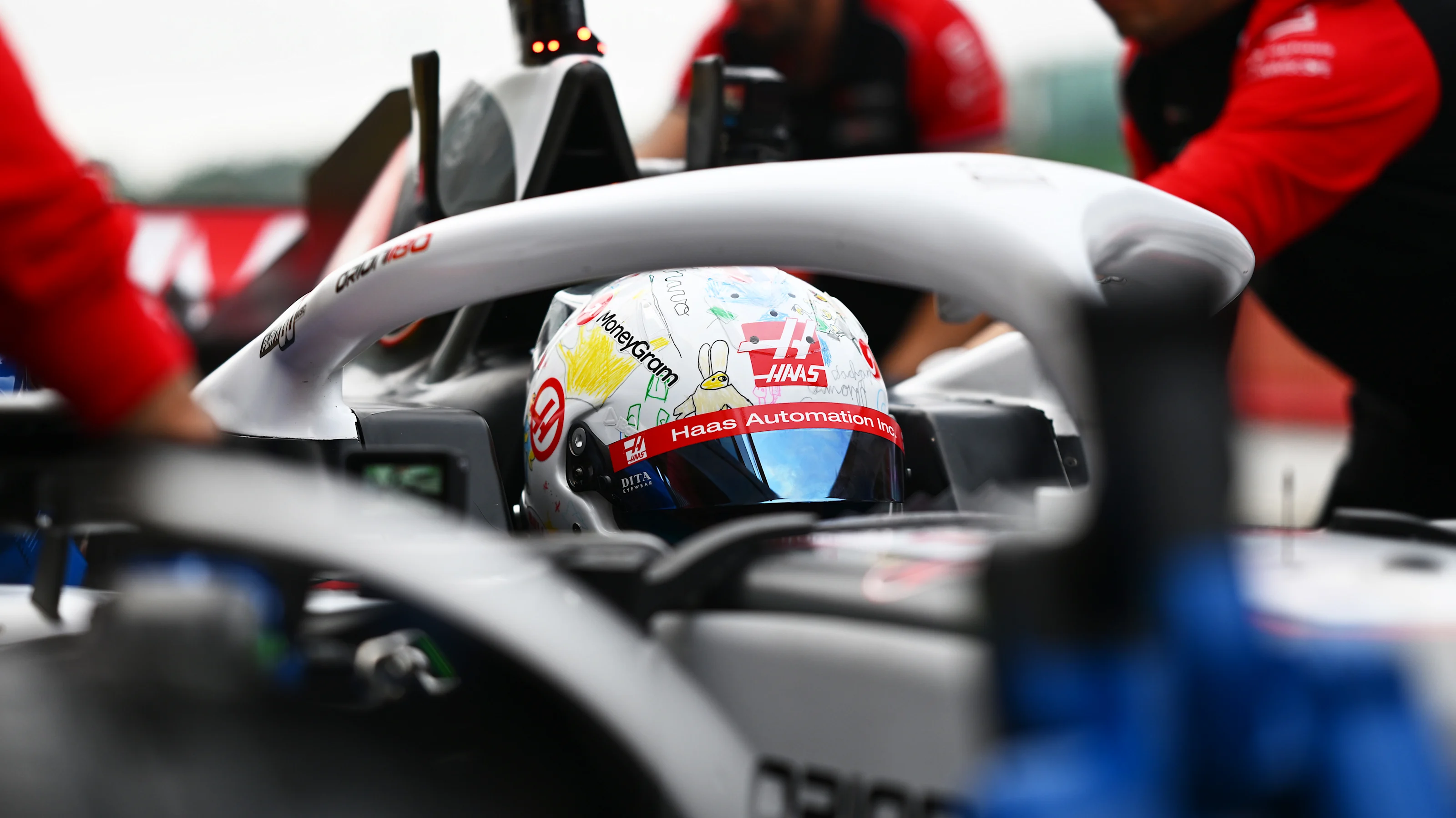 SCARPERIA, ITALY - SEPTEMBER 26: Romain Grosjean of France driving the Haas F1 Ferrari leaves the