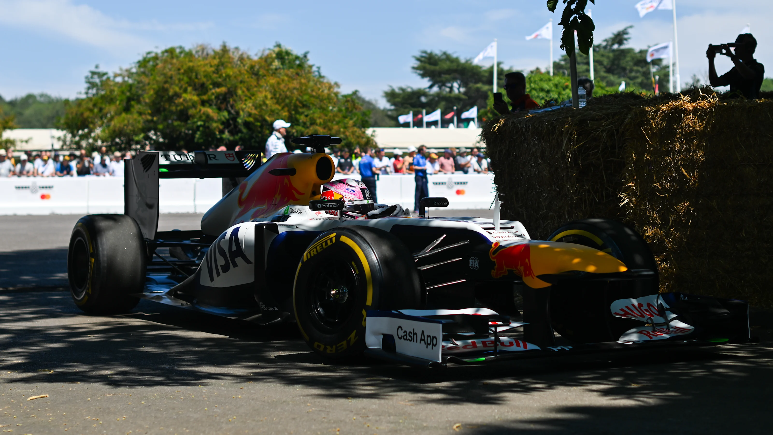 CHICHESTER, ENGLAND - JULY 10: Liam Lawson of New Zealand drives a Red Bull RB8 during the Goodwood