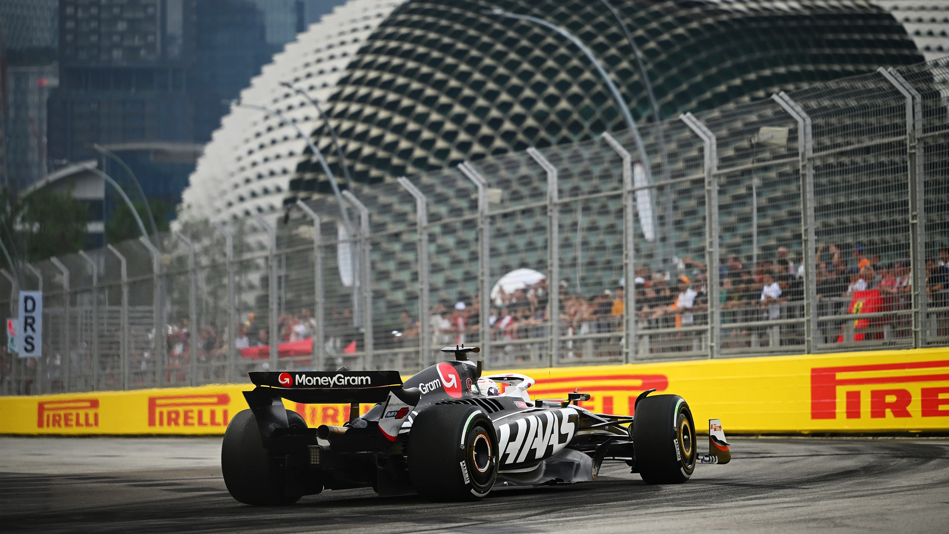 SINGAPORE, SINGAPORE - SEPTEMBER 20: Kevin Magnussen of Denmark driving the (20) Haas F1 VF-24