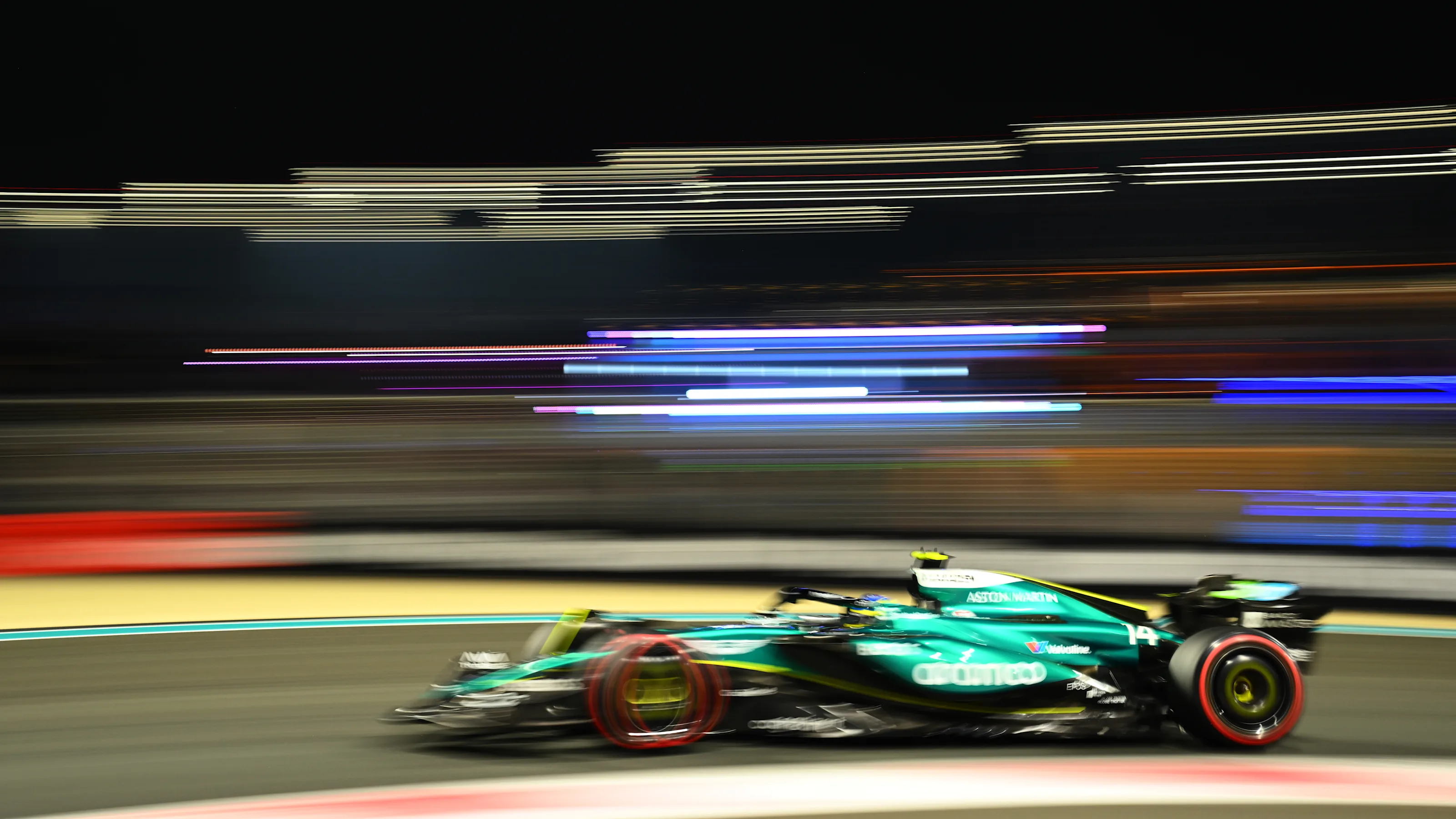 ABU DHABI, UNITED ARAB EMIRATES - DECEMBER 07: Fernando Alonso of Spain driving the (14) Aston