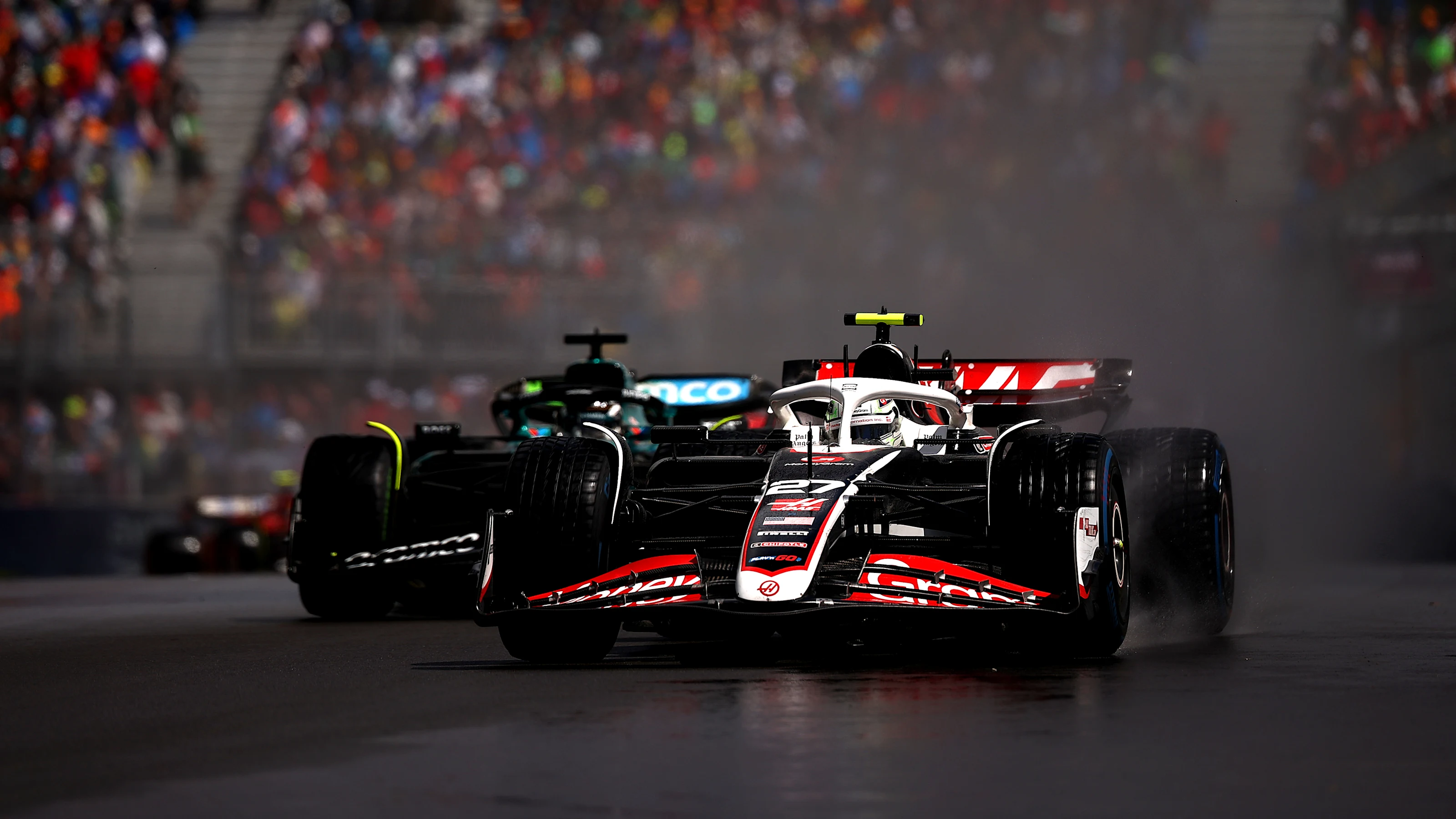MONTREAL, QUEBEC - JUNE 09: Nico Hulkenberg of Germany driving the (27) Haas F1 VF-24 Ferrari leads