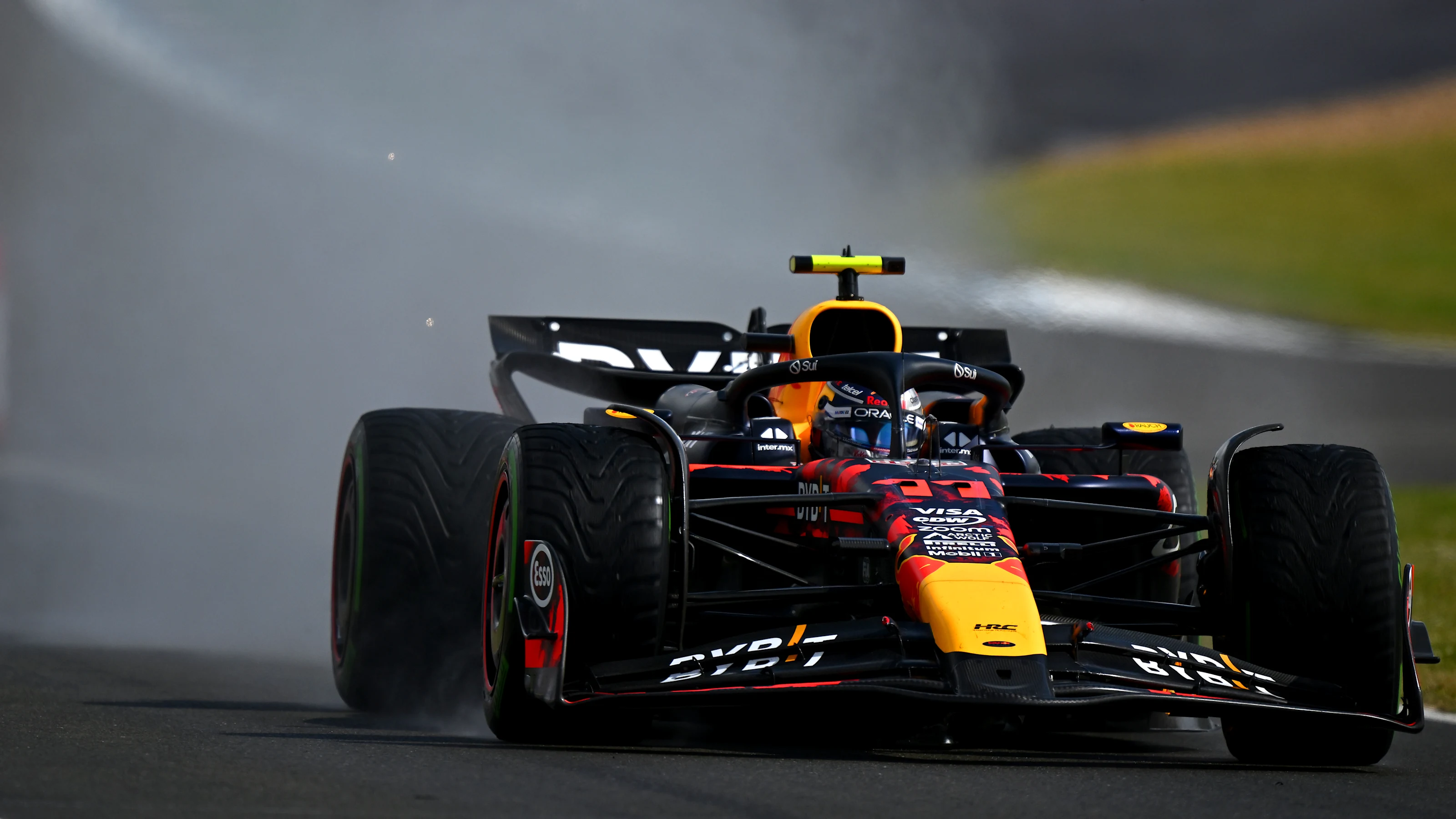 NORTHAMPTON, ENGLAND - JULY 07: Sergio Perez of Mexico driving the (11) Oracle Red Bull Racing RB20