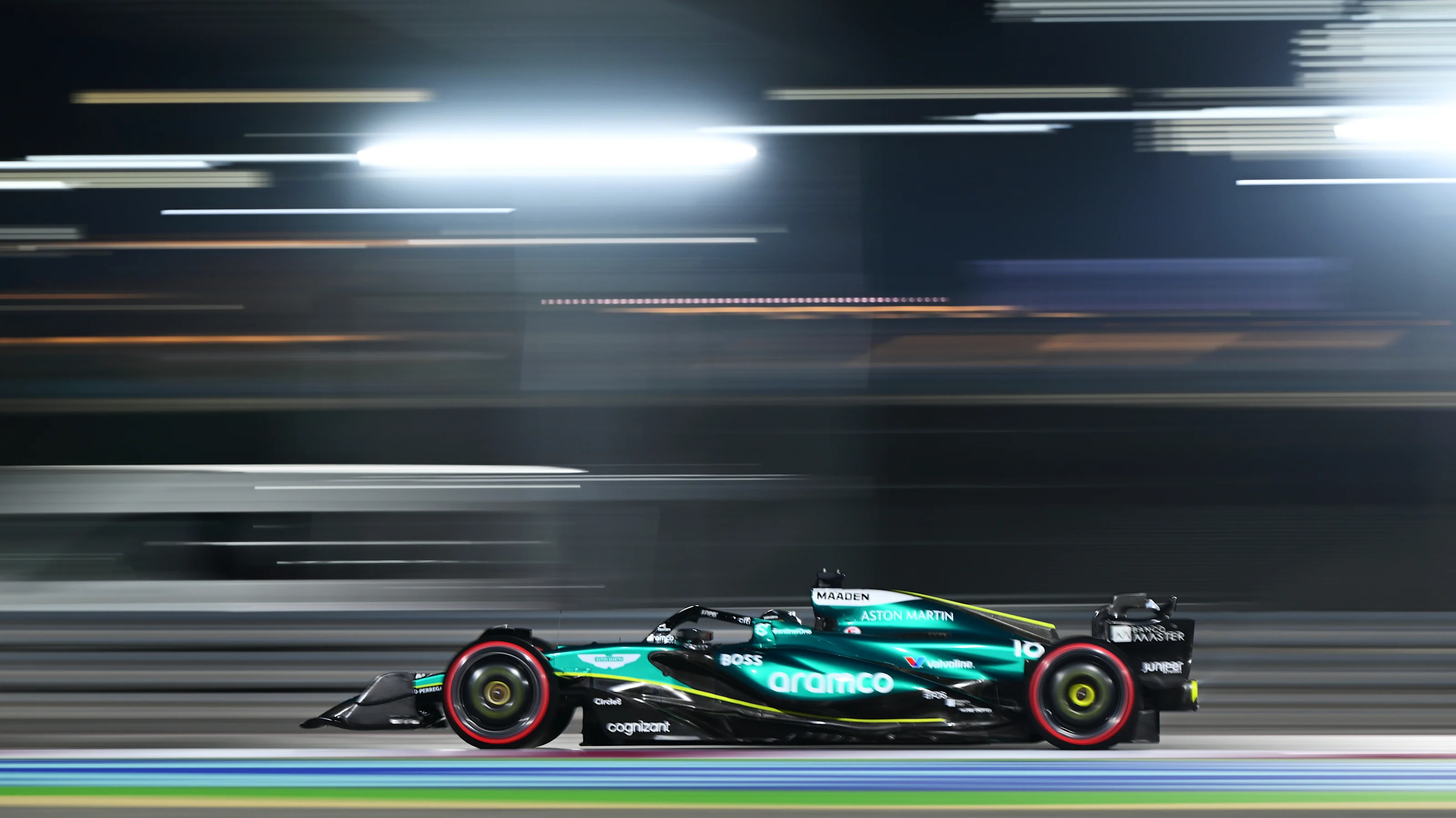 LUSAIL CITY, QATAR - NOVEMBER 30: Lance Stroll of Canada driving the (18) Aston Martin AMR24