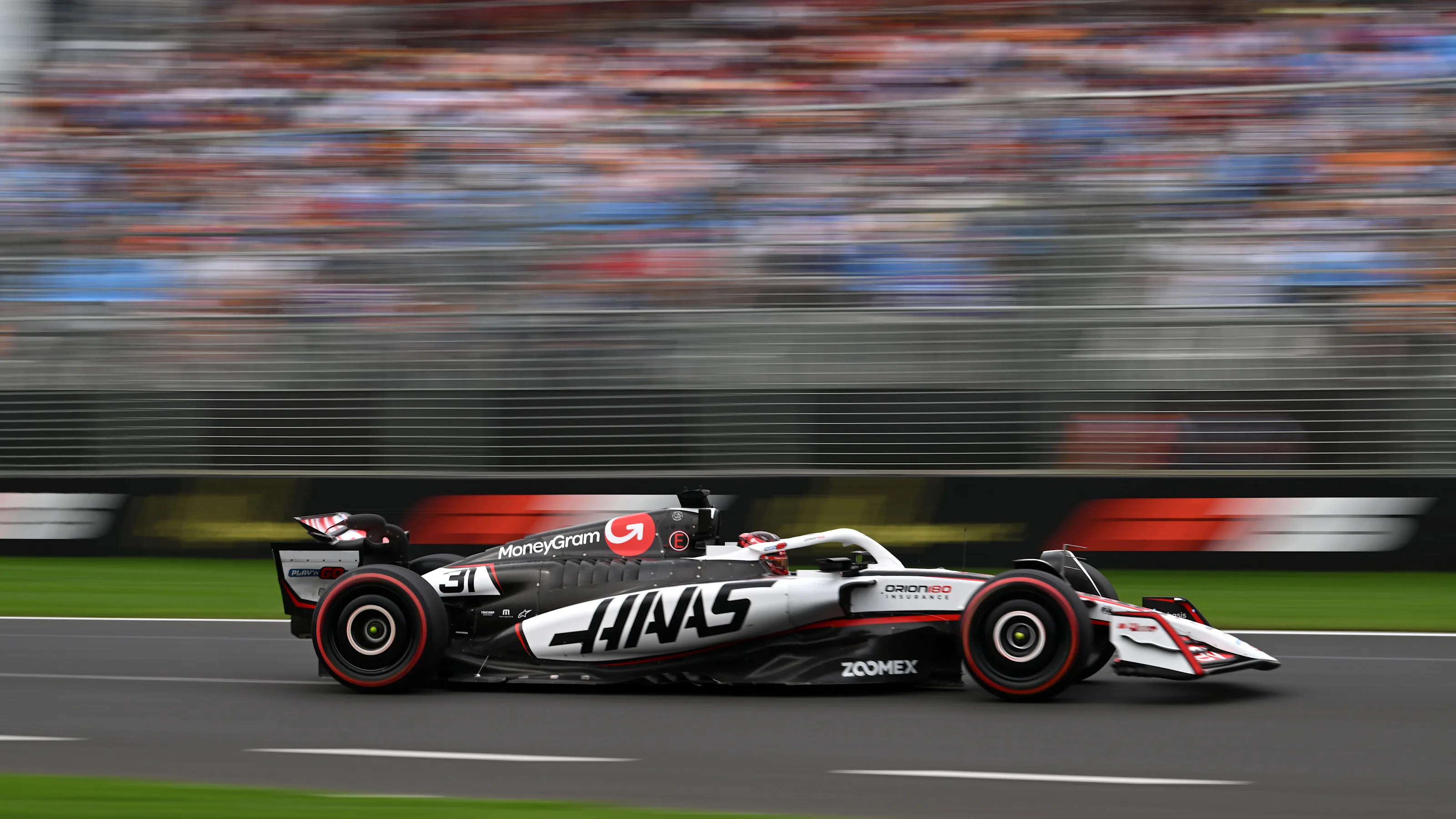MELBOURNE, AUSTRALIA - MARCH 15: Esteban Ocon of France driving the (31) Haas F1 VF-25 Ferrari on