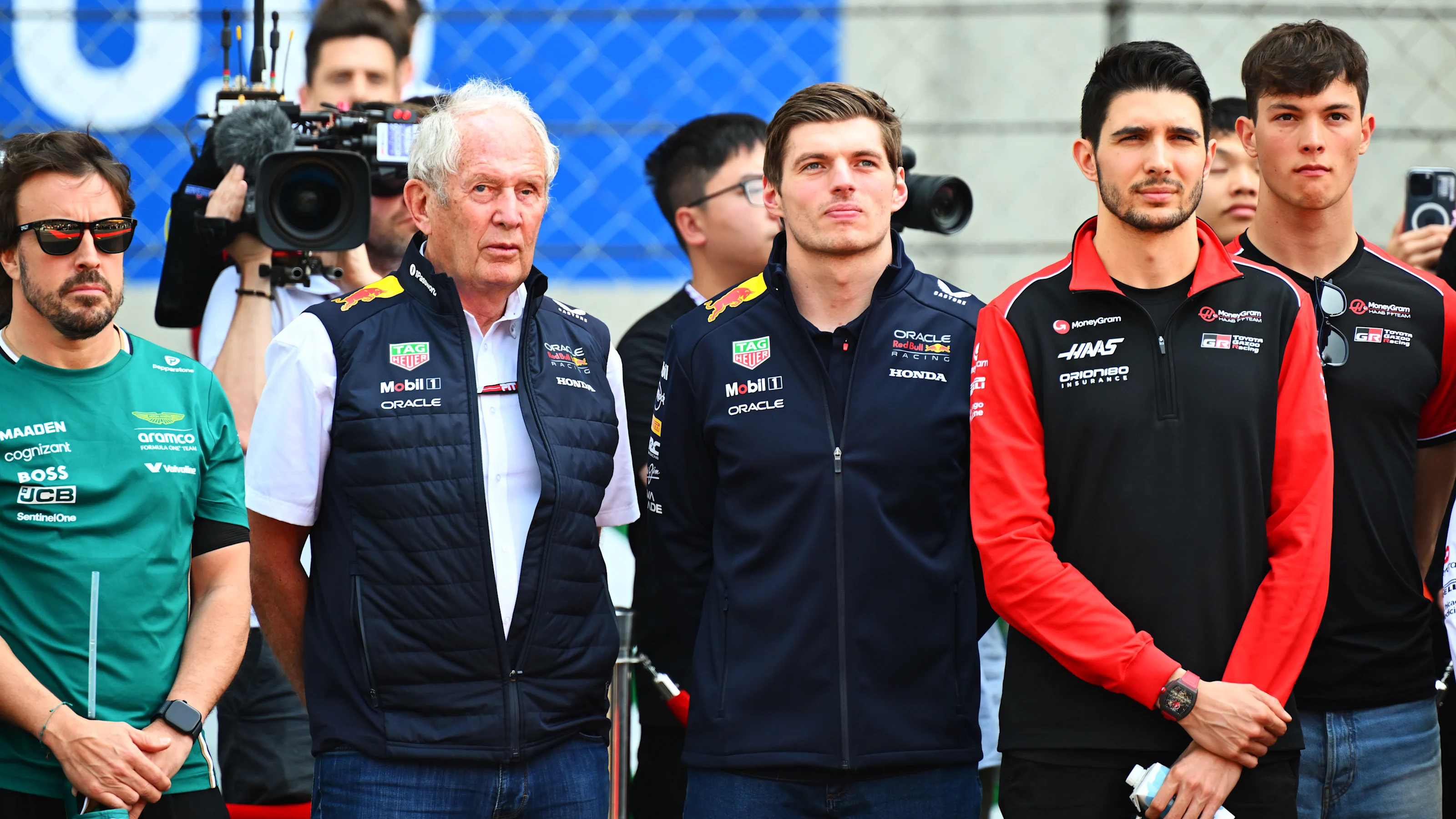 SHANGHAI, CHINA - MARCH 23: Drivers and team personnel gather for a tribute to the late Eddie