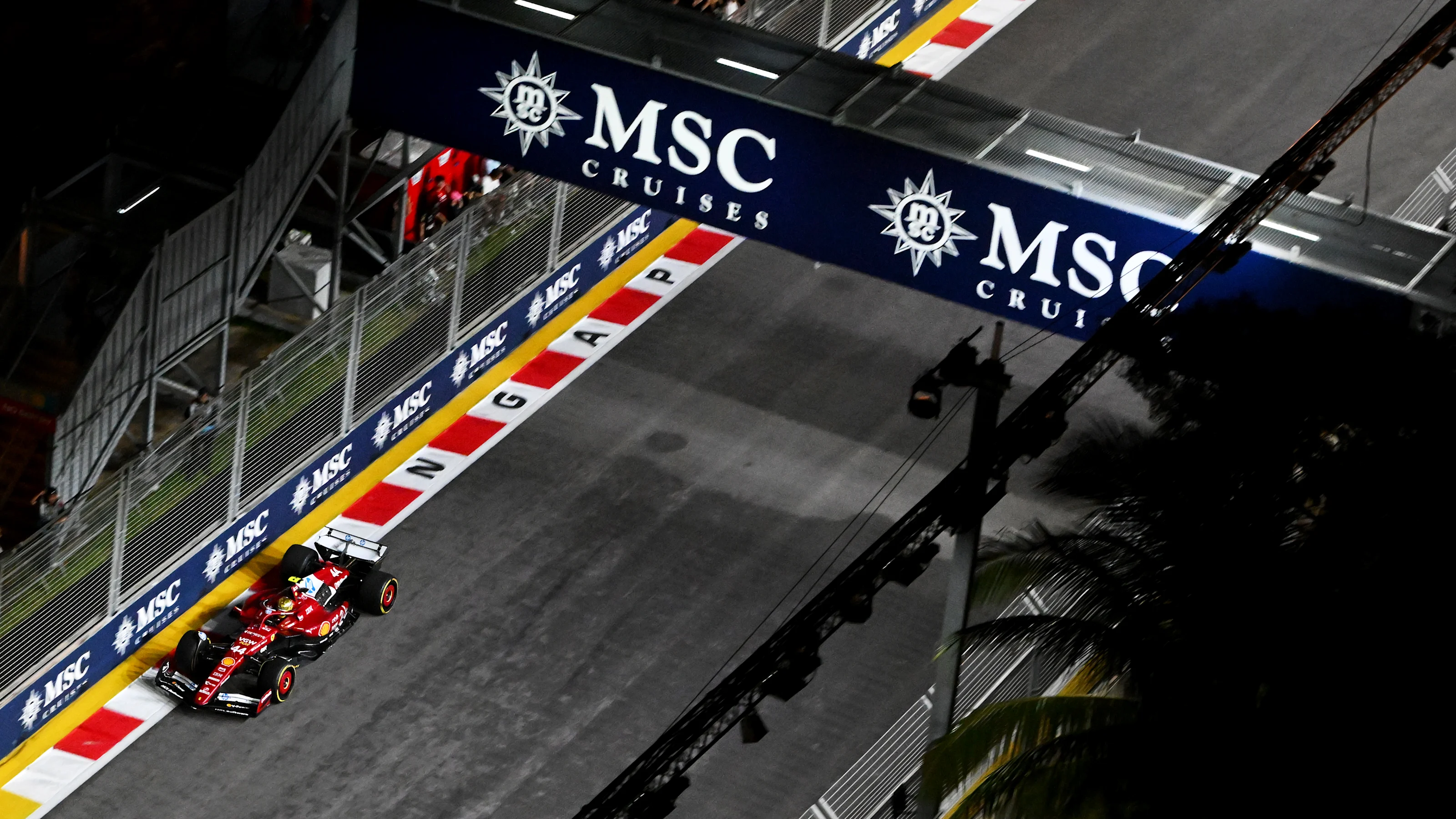 SINGAPORE, SINGAPORE - OCTOBER 05: Lewis Hamilton of Great Britain driving the (44) Scuderia