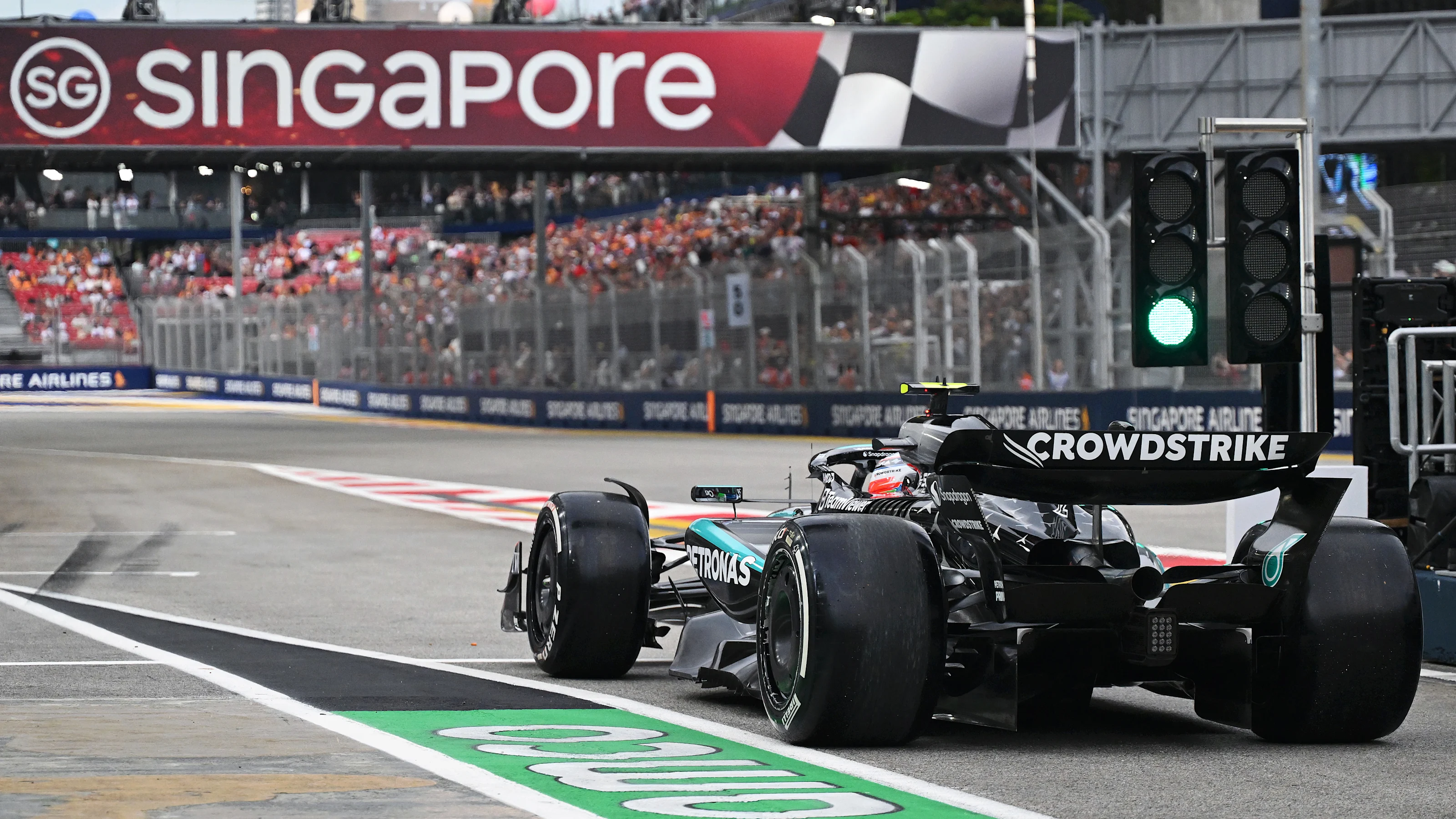 SINGAPORE, SINGAPORE - OCTOBER 03: Andrea Kimi Antonelli of Italy driving the (12) Mercedes AMG