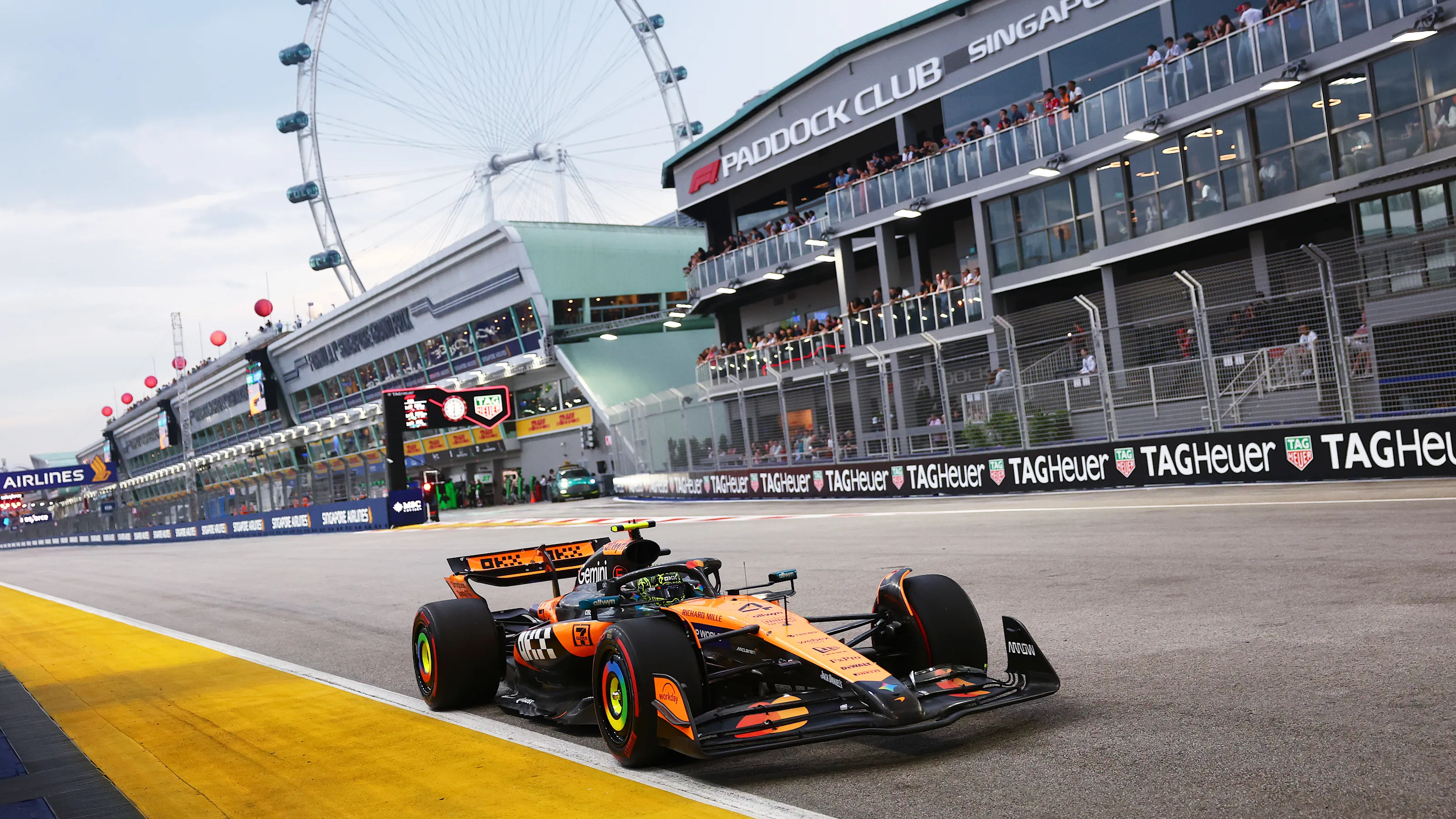 SINGAPORE, SINGAPORE - OCTOBER 03: Lando Norris of Great Britain driving the (4) McLaren MCL39